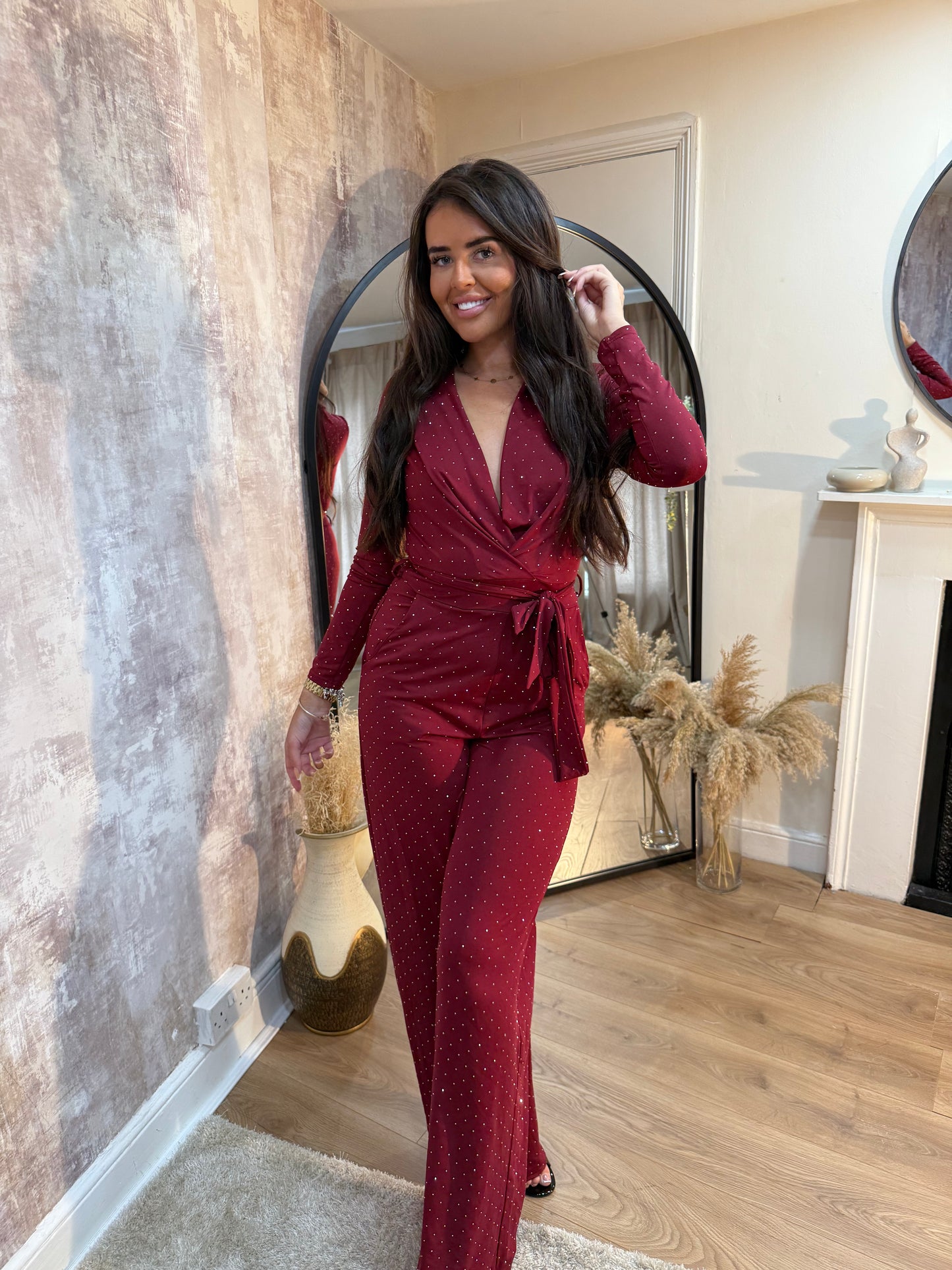 DIAMANTE LONG SLEEVED FLARED LEG JUMPSUIT